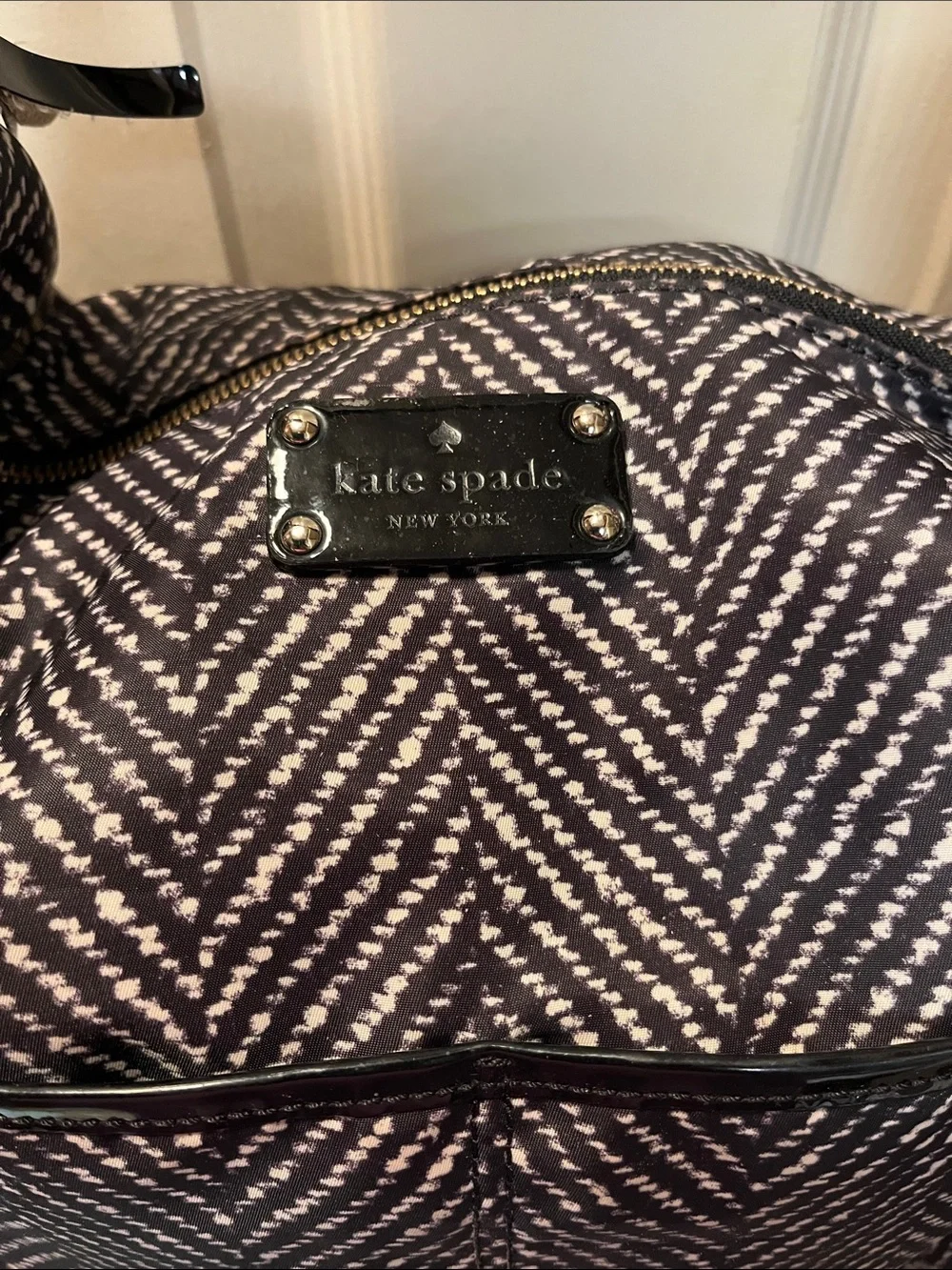 Flawed Kate Spade Stevie Baby/Diaper Bag Blk white herringbone purple interior